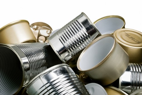 Storage containers labelled for segregation of office waste types